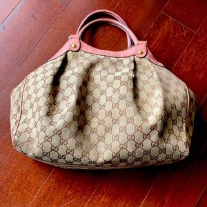 Gucci bag with bunk leather straps